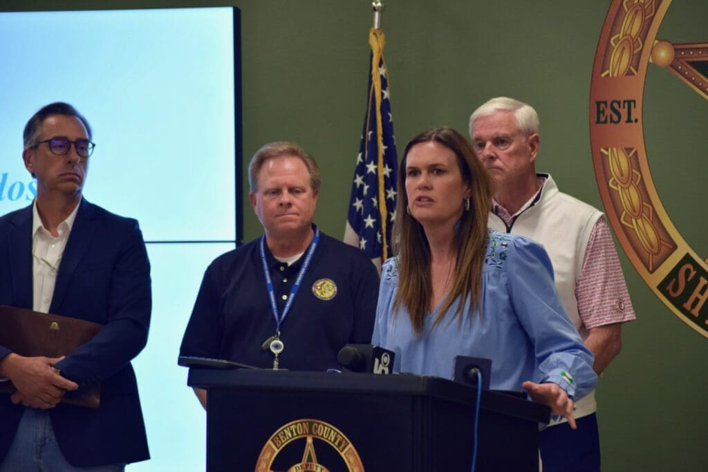 Severe weather: gov. Sarah huckabee sanders, flanked by arkansas division of emergency management director a. J. Gary, benton county judge barry moehring and u. S. Rep. Steve womack, provides an update on storm damage during a press conference on may 26, 2024 at the benton county sheriff’s office.