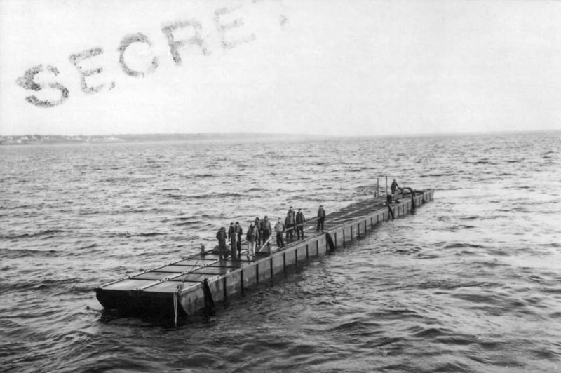 How The Gaza Humanitarian Aid Pier Traces Its Origins To Discarded Cigar Boxes Before World War Ii Pontoon causeway is assembled and tested.