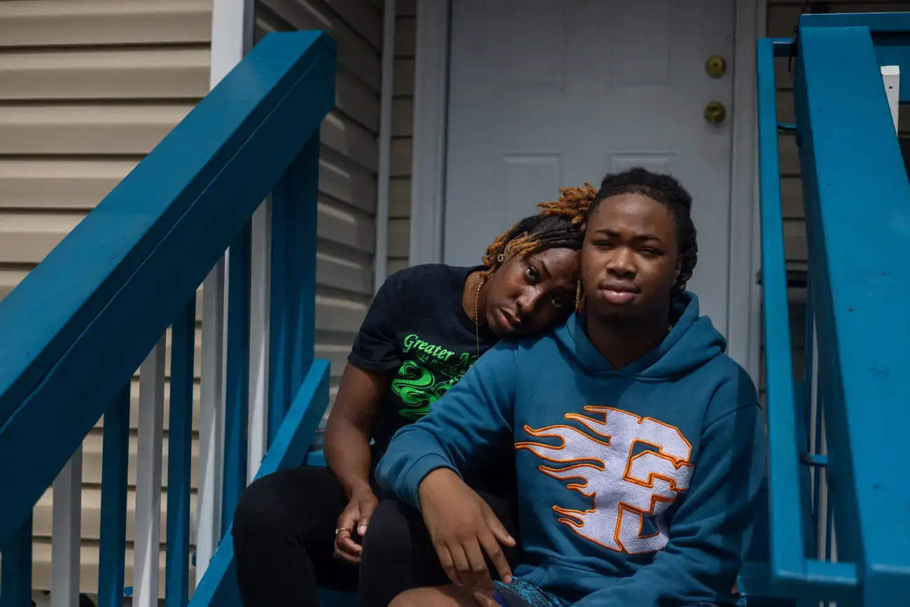 Louisiana illegal film police Teliah Perkins and her son De’Shaun Johnson outside their home in Slidell, Louisiana