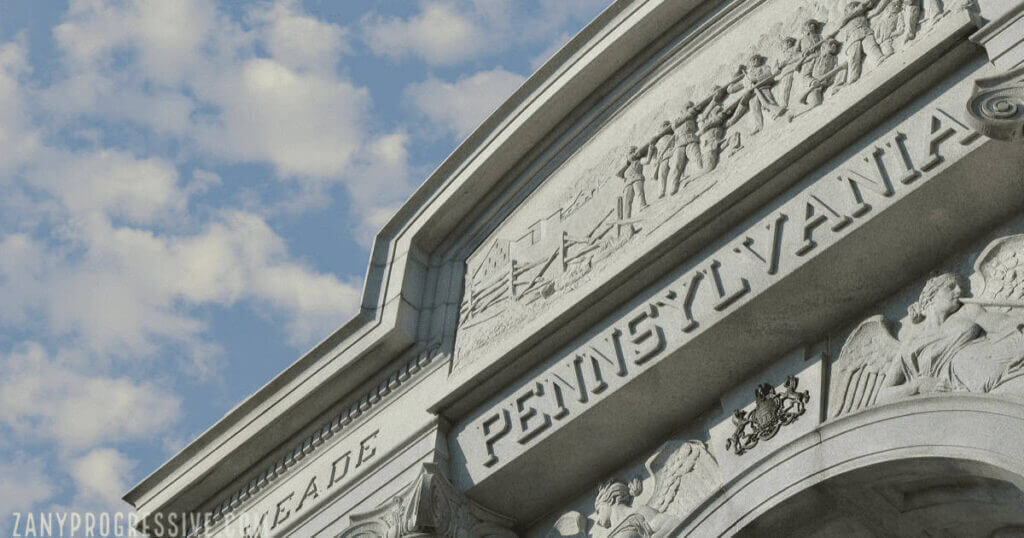 A granite arch with pennsylvania carved into it