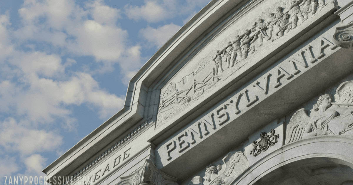 A granite arch with pennsylvania carved into it