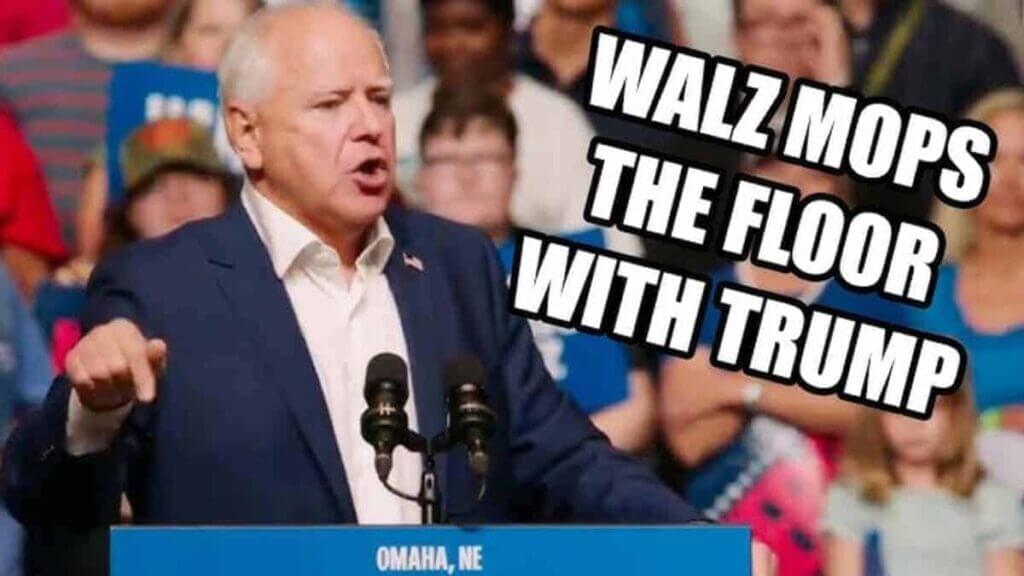 Tim walz on stage at a campaign rally