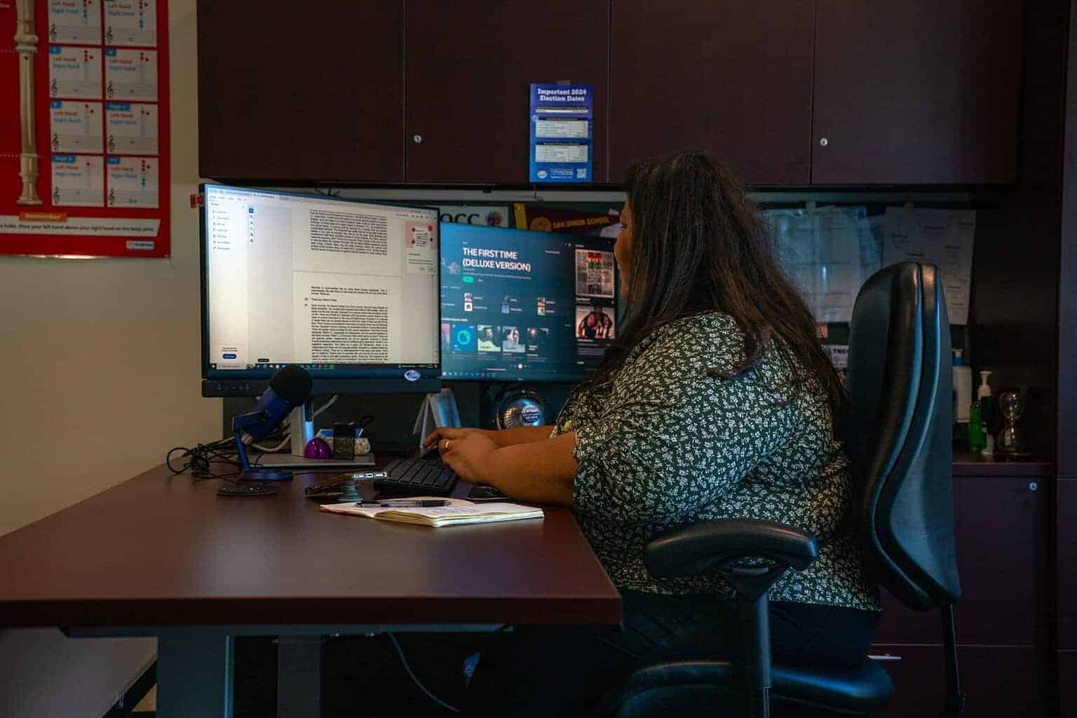 Gabriella cavares kelly working in her office.