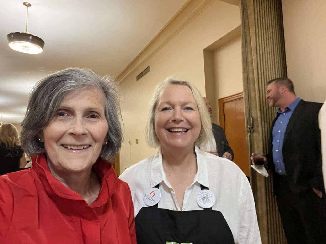 Kathy webb and tippi mccullough pose together for a selfie.