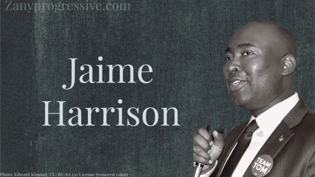Photo of jamie harrison in black and white on a dark gray background