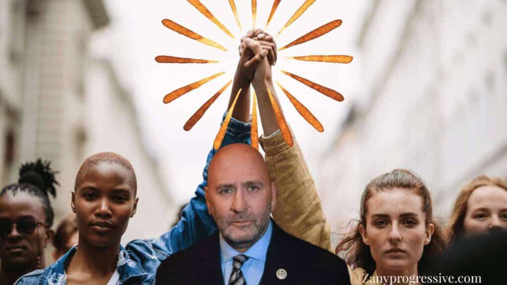 Representative clay higgins in front of 2 women with arms raised, holding hands—one white, the other black.