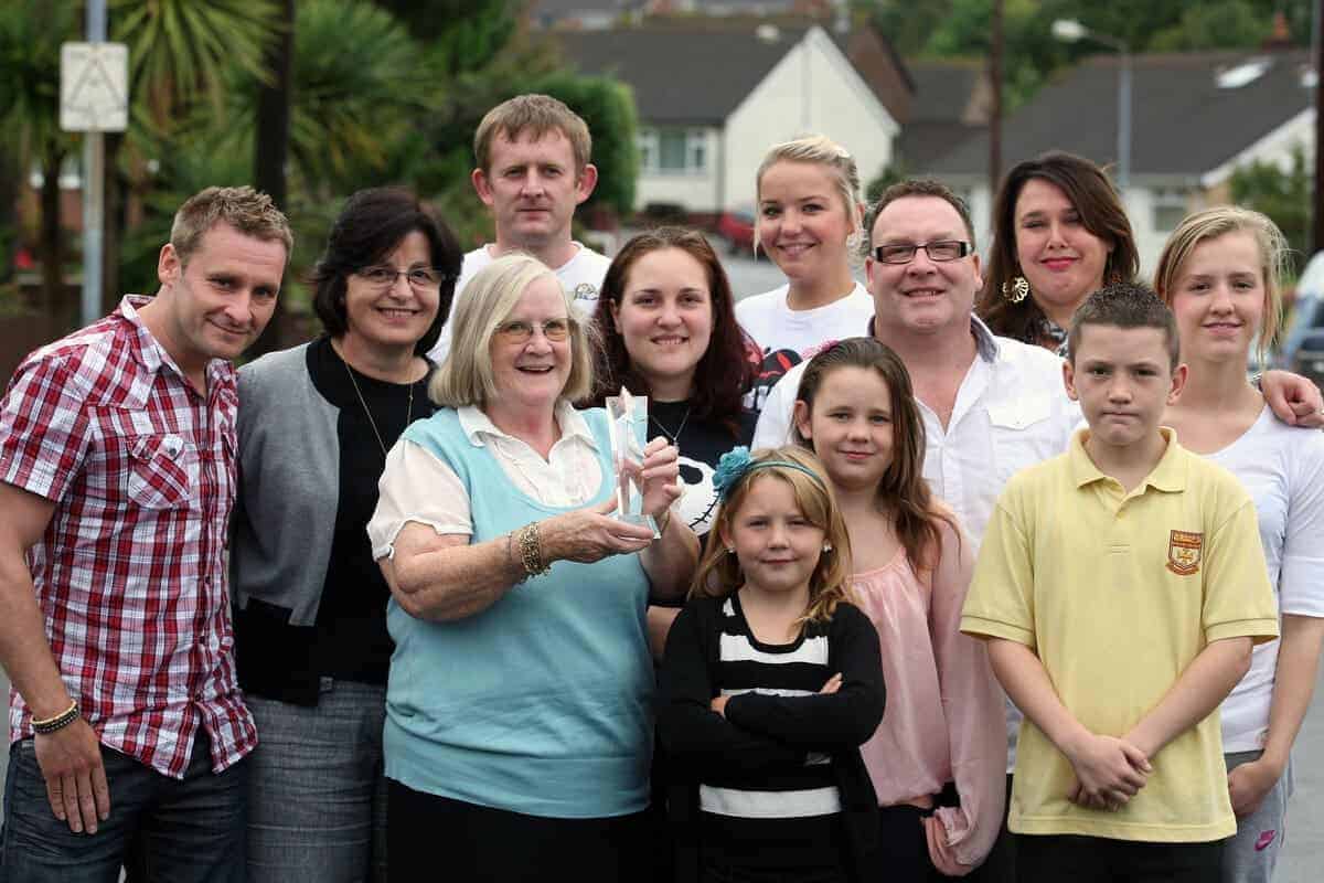 A foster parent with current and past foster children