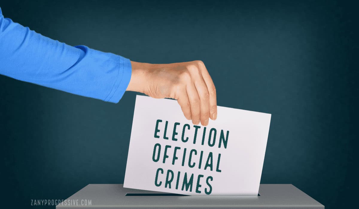 A hand putting a ballot in an old style wooden ballot box