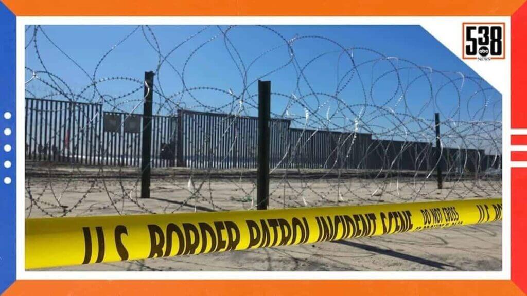 The southern border wall and barbed wire