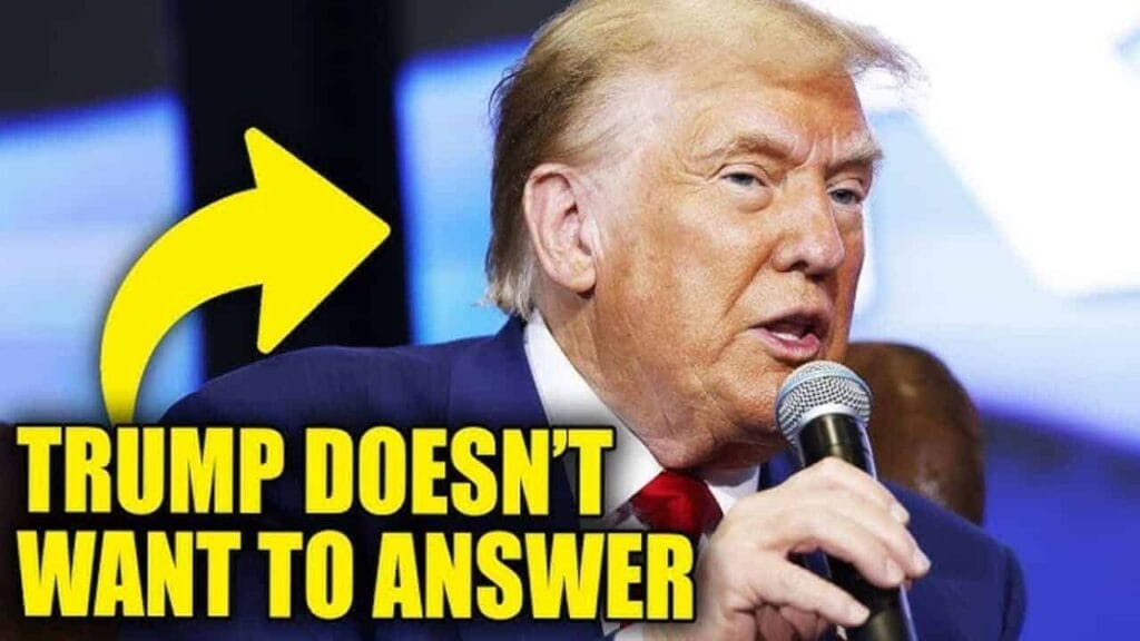 Donald trump holding a microphone
