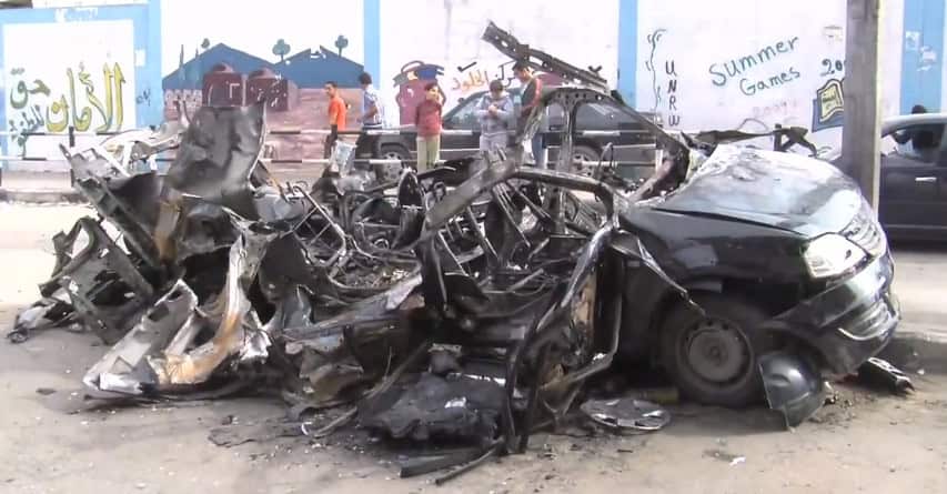 Car in gaza after being hit with an israeli bomb