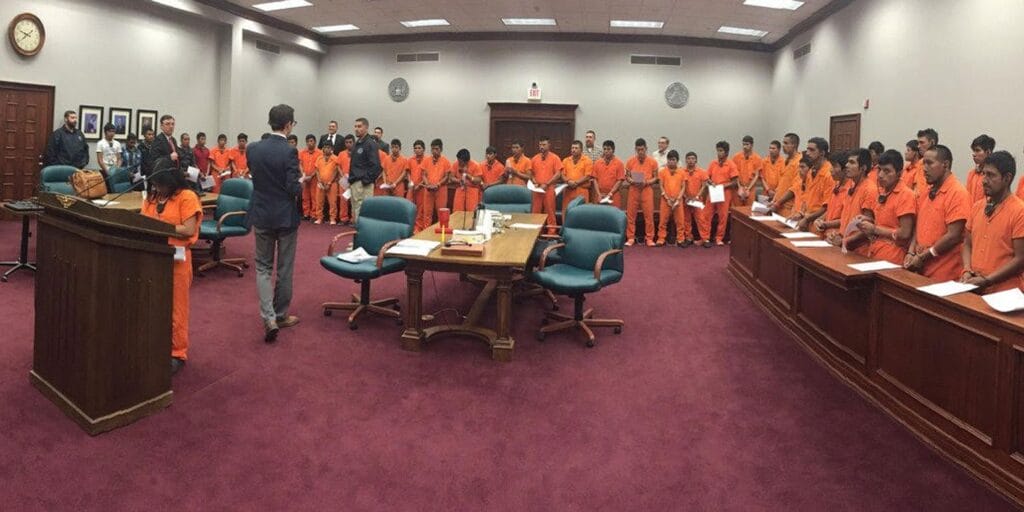 Self deportation notice. A mass trial of immigrants at the lucius d. Bunton federal courthouse in pecos, texas.