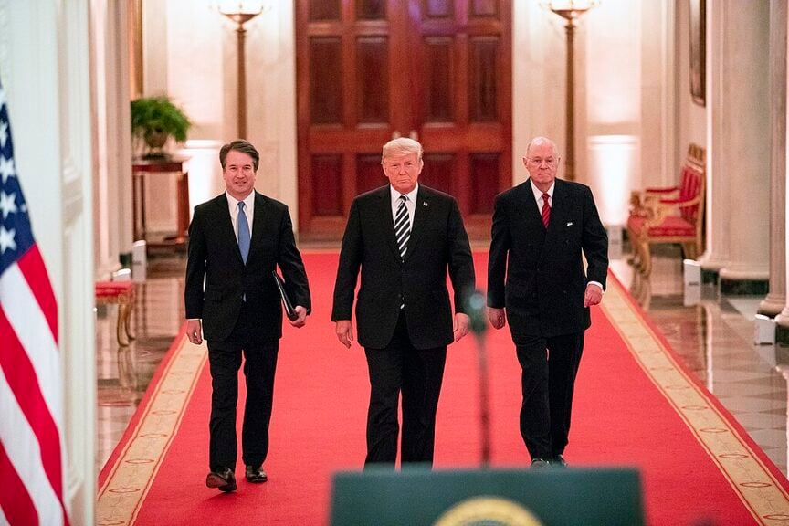 Trump walking with brett kavanaugh and a retired justice